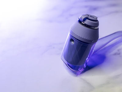 Proxy Bloom standing on marble surface with soft purple lighting