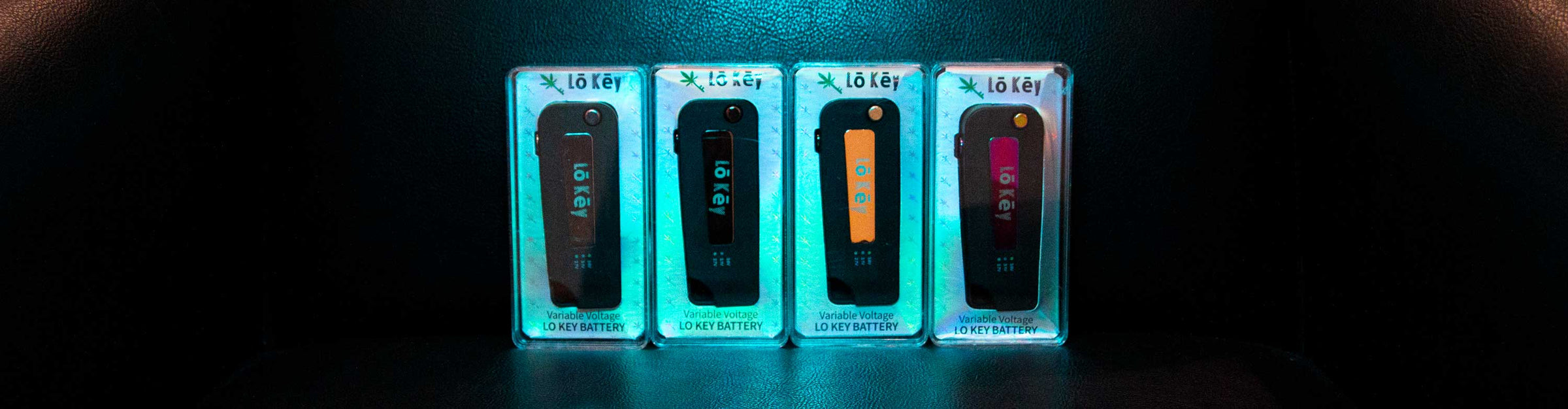 LoKey Vaporizers standing in black background with blue lighting.