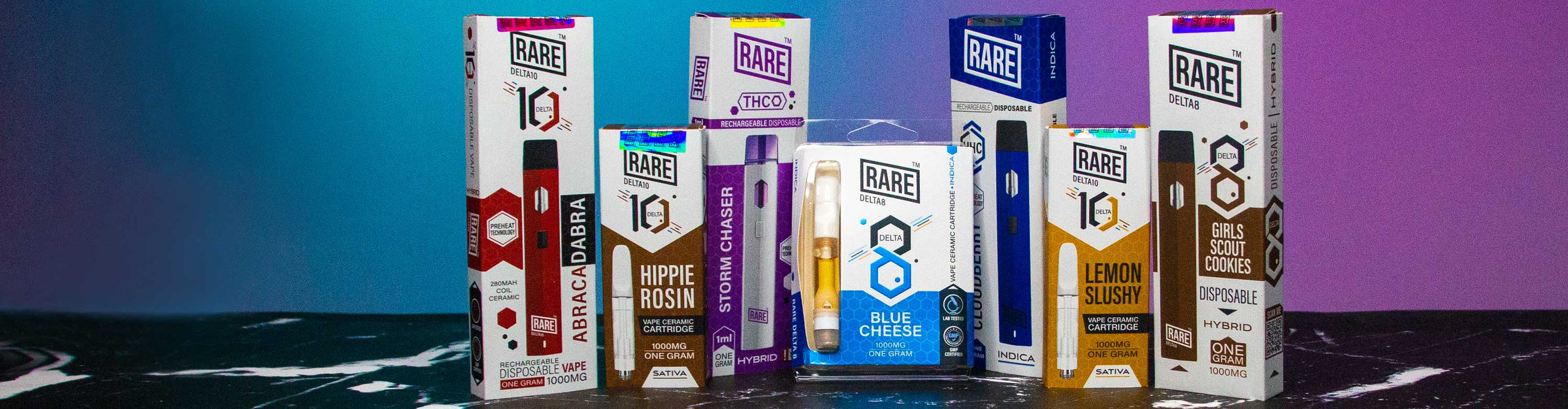 Rare Bar CBD Cartridges and Disposables standing on black marbled textured desk with blue and purple lighting