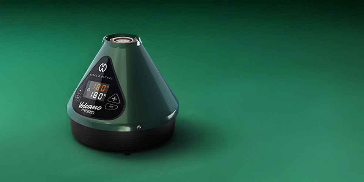 Storz & Bickel Volcano Hybrid Evergreen Edition on a green background