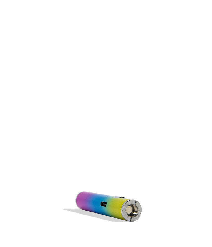 A WULF MODS Hito, small cylindrical electronic device with a rainbow gradient finish, lying horizontally on a plain white background.