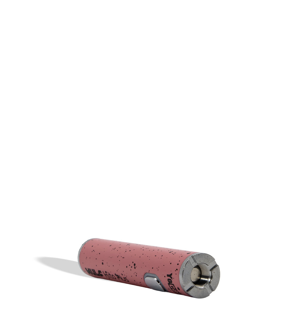 A single cylindrical battery with a speckled dusty pink casing and a metallic silver end cap, positioned horizontally on a clean white background.