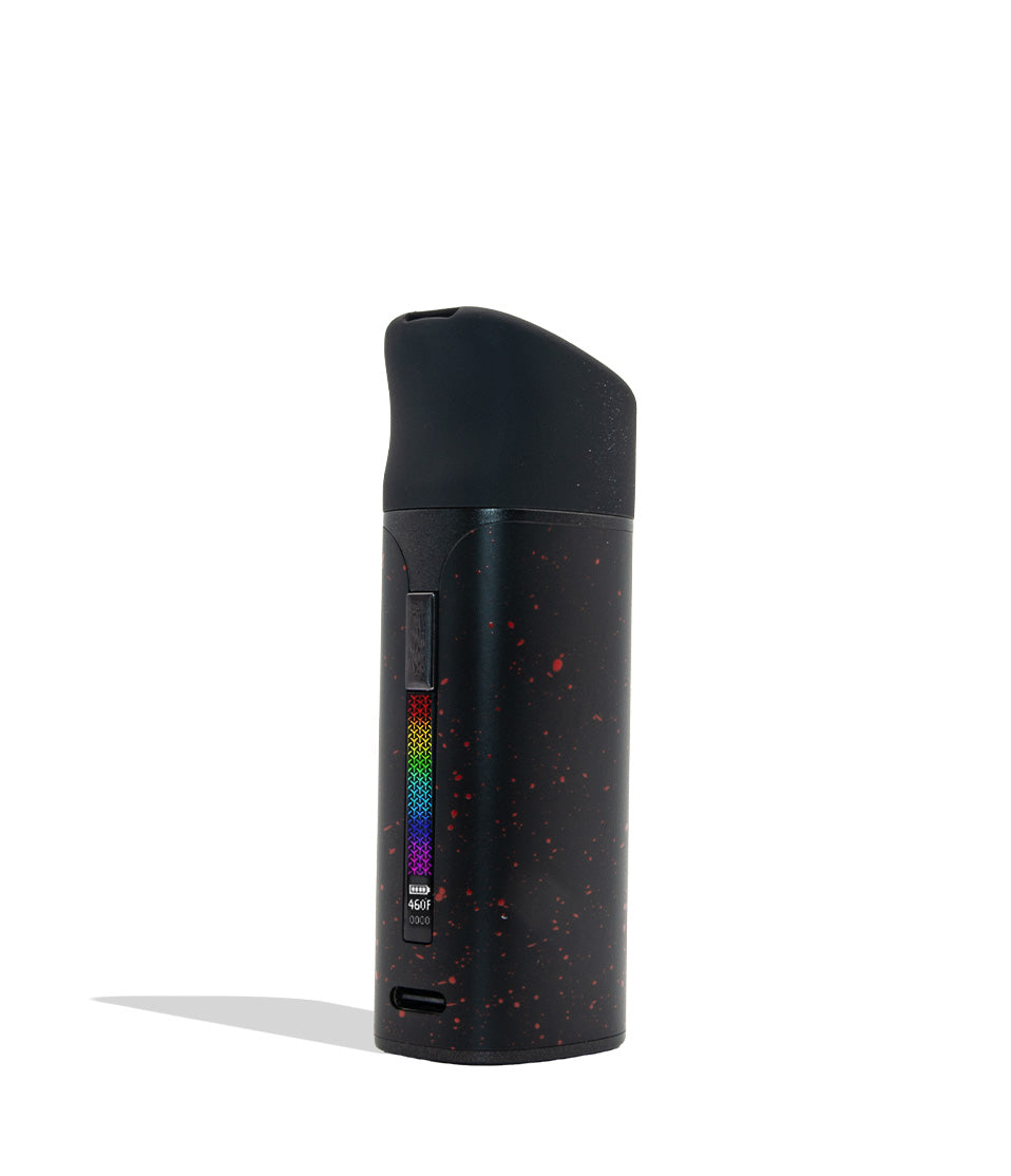 WULF MODS Pocket Mini concentrate vaporizer in black with red spatter pattern details, featuring a vertical rainbow LED indicator light on the side, shown against a plain white background.