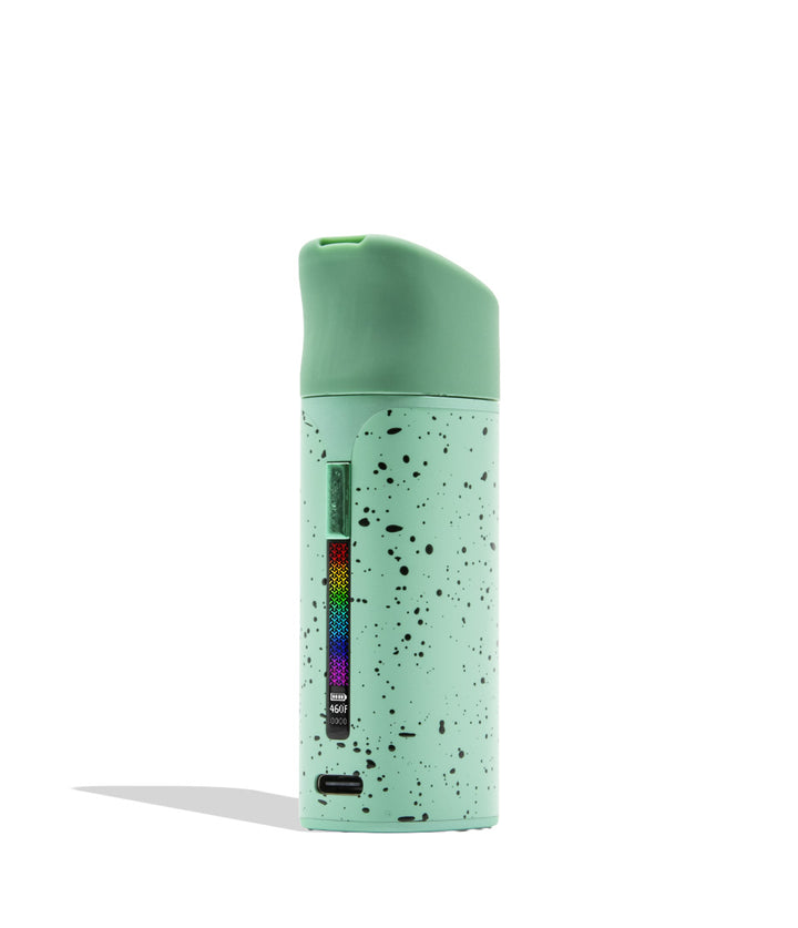 WULF MODS Pocket Mini portable concentrate vaporizer in teal/mint with black spatter pattern details, featuring a vertical rainbow LED indicator light on the side, shown against a plain white background.