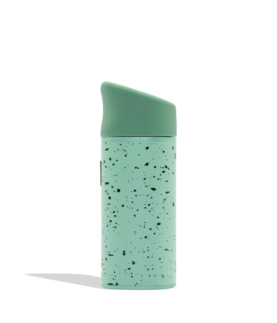 WULF MODS Pocket Mini portable concentrate vaporizer in teal/mint with black spatter pattern details, featuring a vertical rainbow LED indicator light on the side, shown against a plain white background. Side view