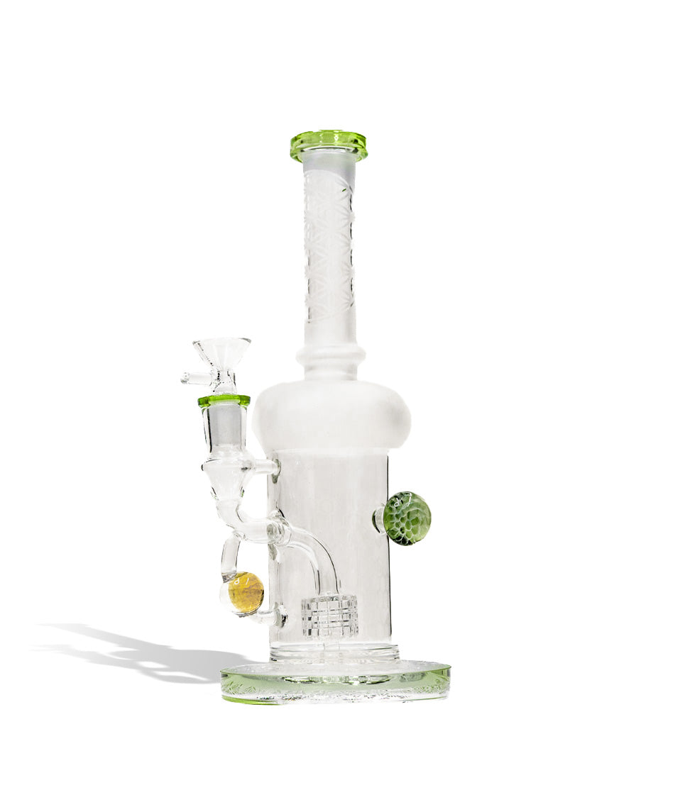 Green slime 9 inch water pipe with honey comb perc and 14mm funnel bowl on white studio background
