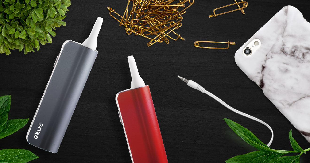 Colored Exxus Snap VV Vaporizers on black