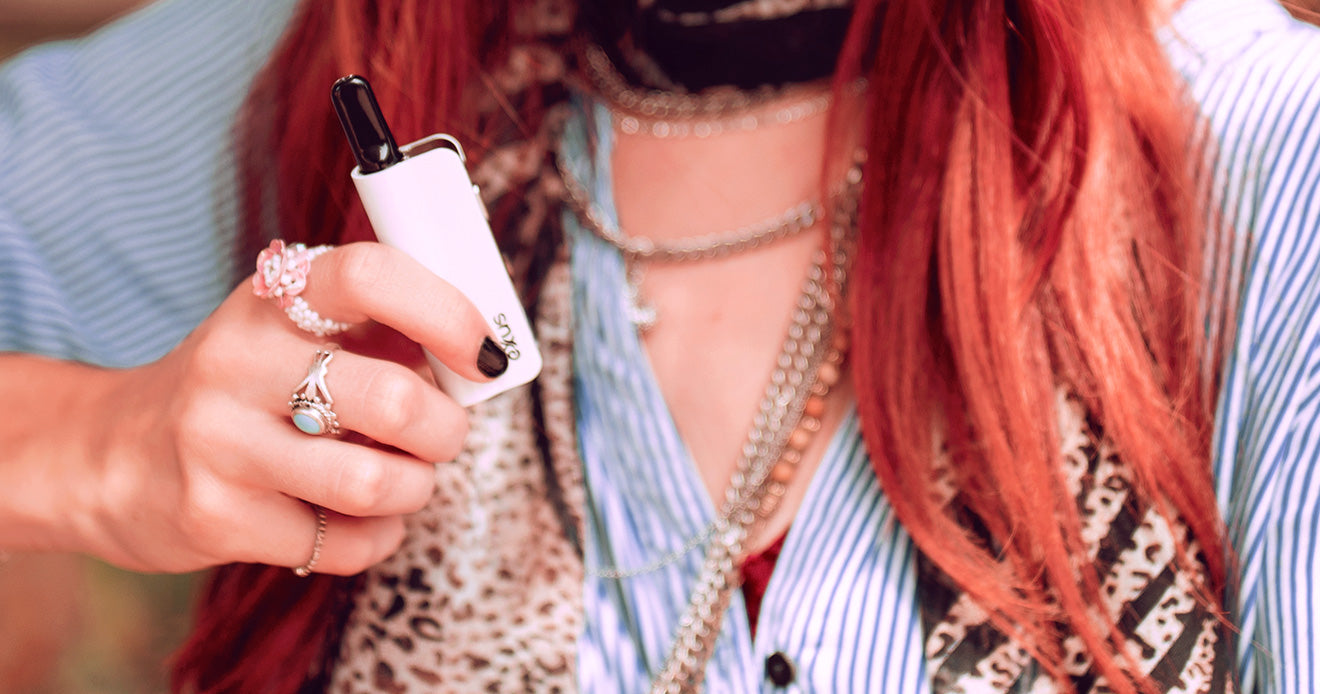 Woman holding pearl Exxus Snap VV