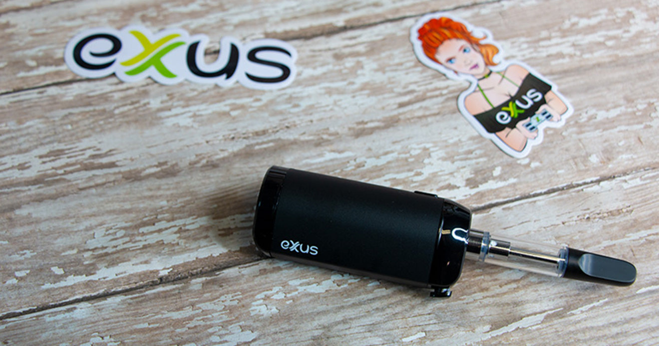 Black Exxus VRS with cartridge on top on wooden background