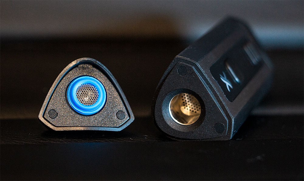 Two GVR dry herb vaporizers, one with a blue lit display