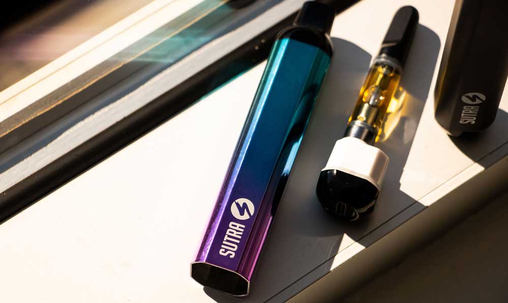 Sutra Silo 510 thread batteries standing on a ledge with cartridges attached