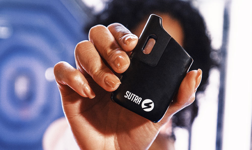 Sutra Mini in woman's hand in an arcade