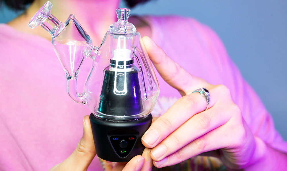 Sutra DBR Pro in woman's hand with blue studio lighting