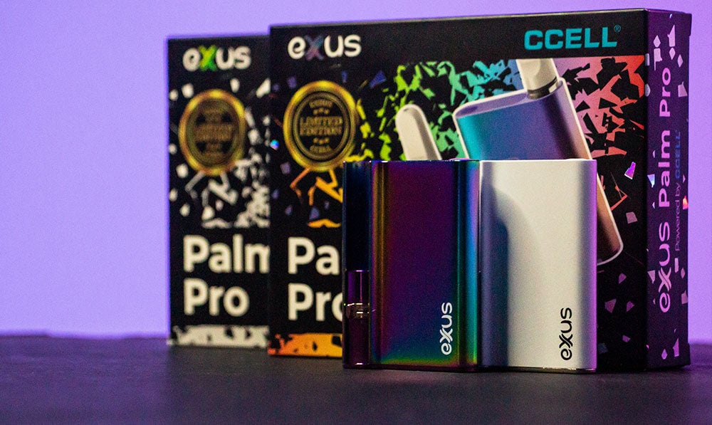 Exxus Palm Pro 510 Thread Battery standing on black surface with Purple background