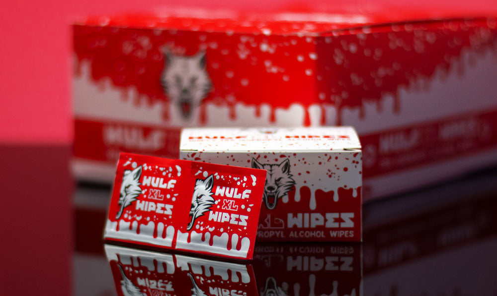 Wulf Mods Cleaning Wipes on reflective glass surface display