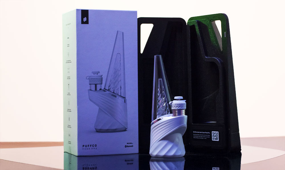 Puffco Peak Pro 3DXL standing on reflective marble surface