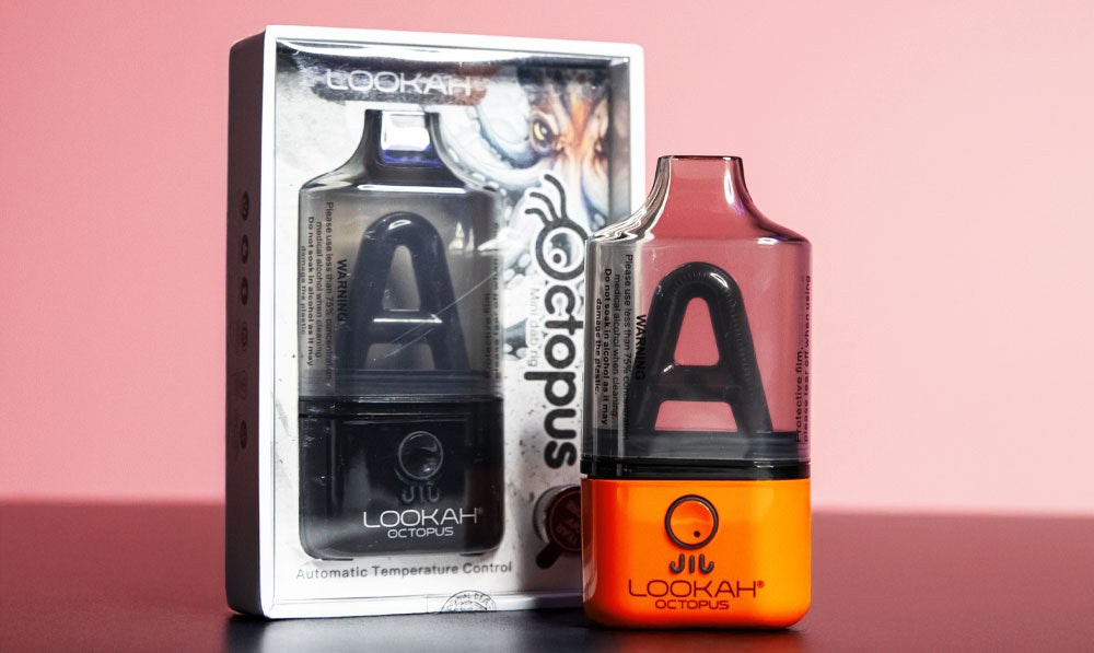 Lookah Octopus on dark reflective surface with soft red lighting