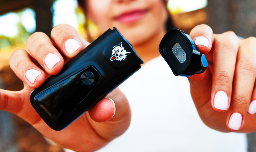 Woman holding Wulf Mods Flex apart in park