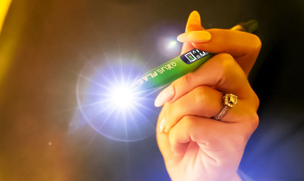 Woman holding Exxus flash
