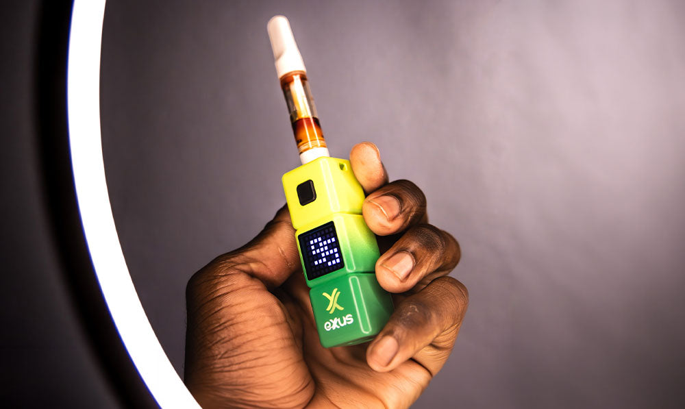 hand holding Exxus Stax with light