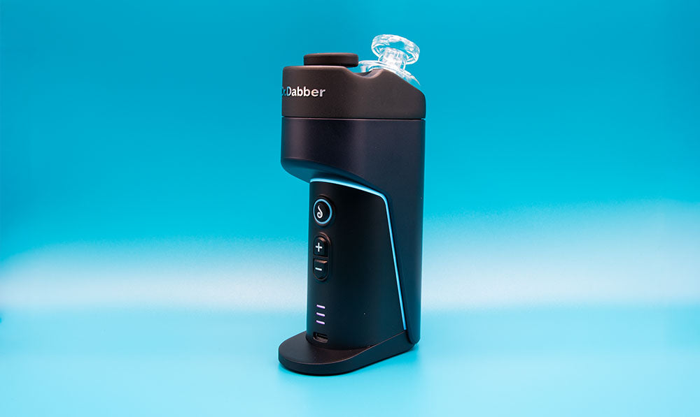 Dr Dabber switch go standing on blue background