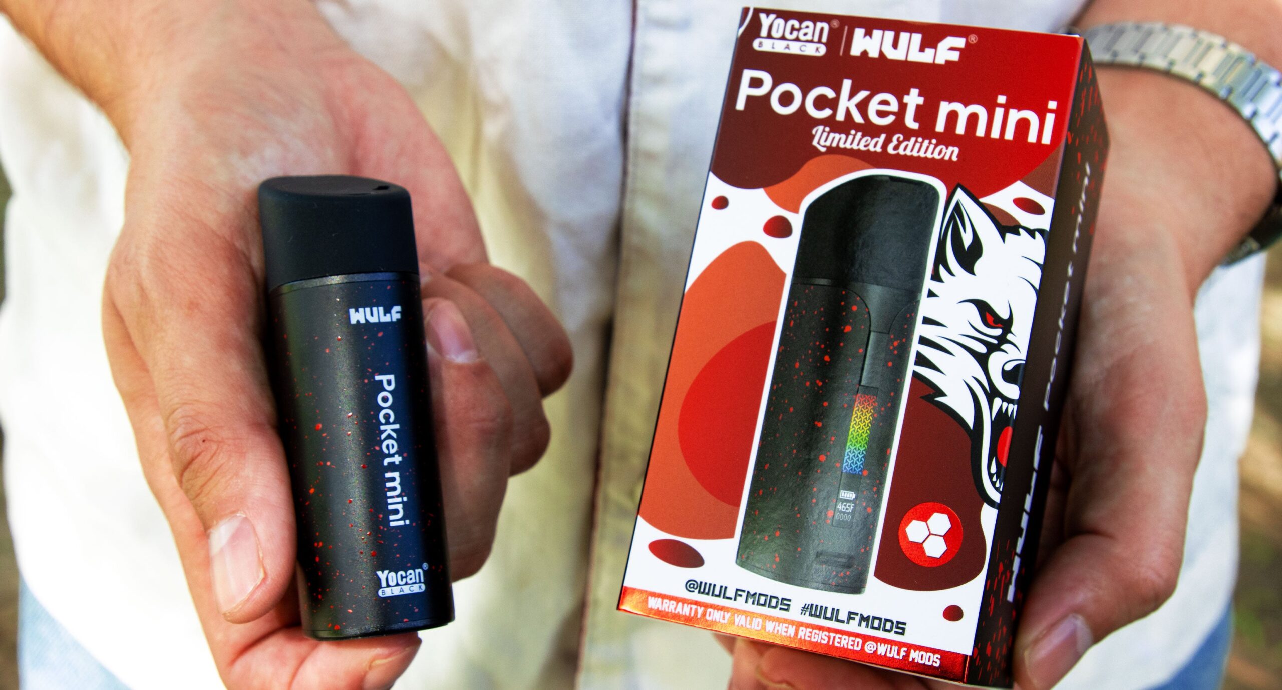 Wulf Pocket Mini box packaging and product in man's hands lifestyle image at park
