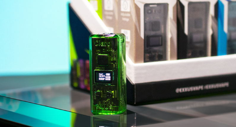 Green Exxus Claro 510 thread battery standing on a counter