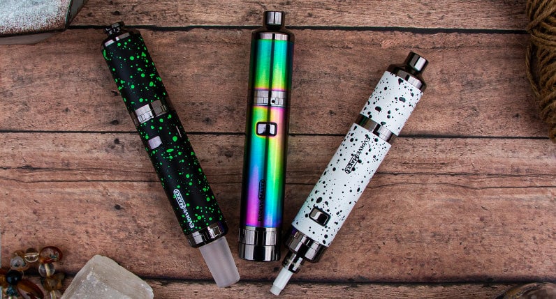 Wulf Evolve Maxxx in all 3 modes laying down on wooden table