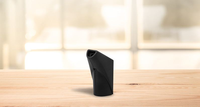 G Pen Roam Replacement Mouthpiece standing on wooden table inside house.