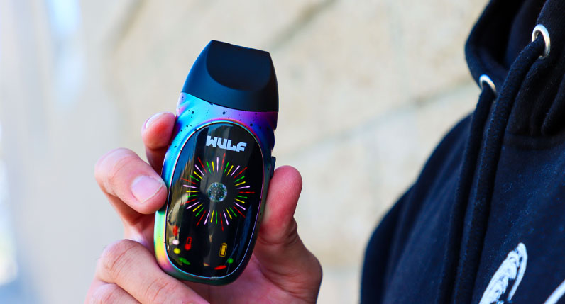 WULF Faze in a holographic finish held against a blue jacket