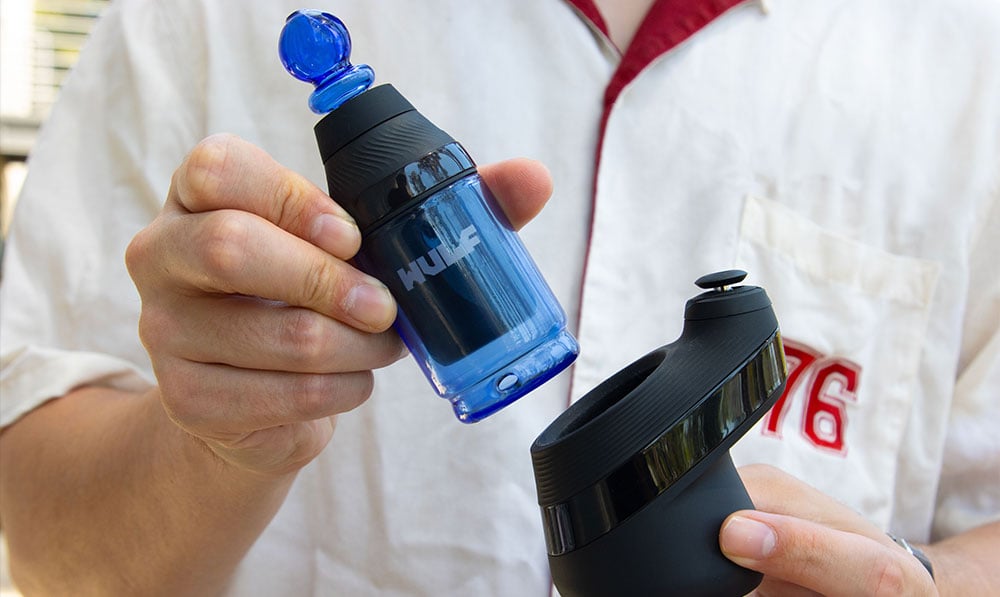 man holding wulf merge product showcasing how to assemble lifestyle image